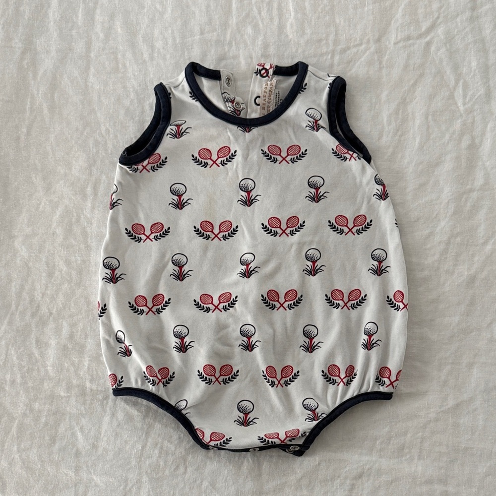 The Beaufort Bonnet Company White Baby One-Piece with Red and Navy Tennis Print